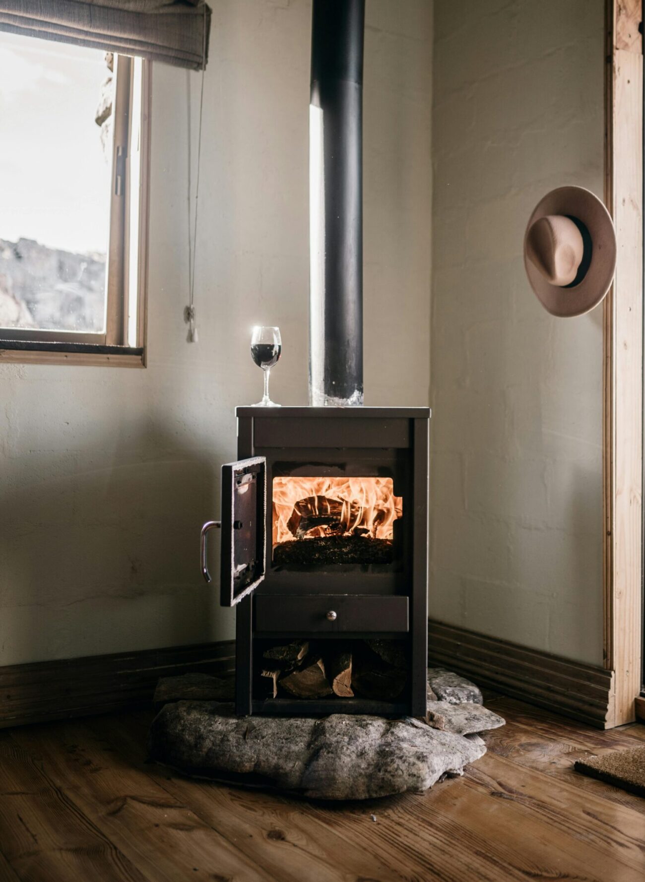 Illustration showing proper clearances per wood stove heat shield requirements
